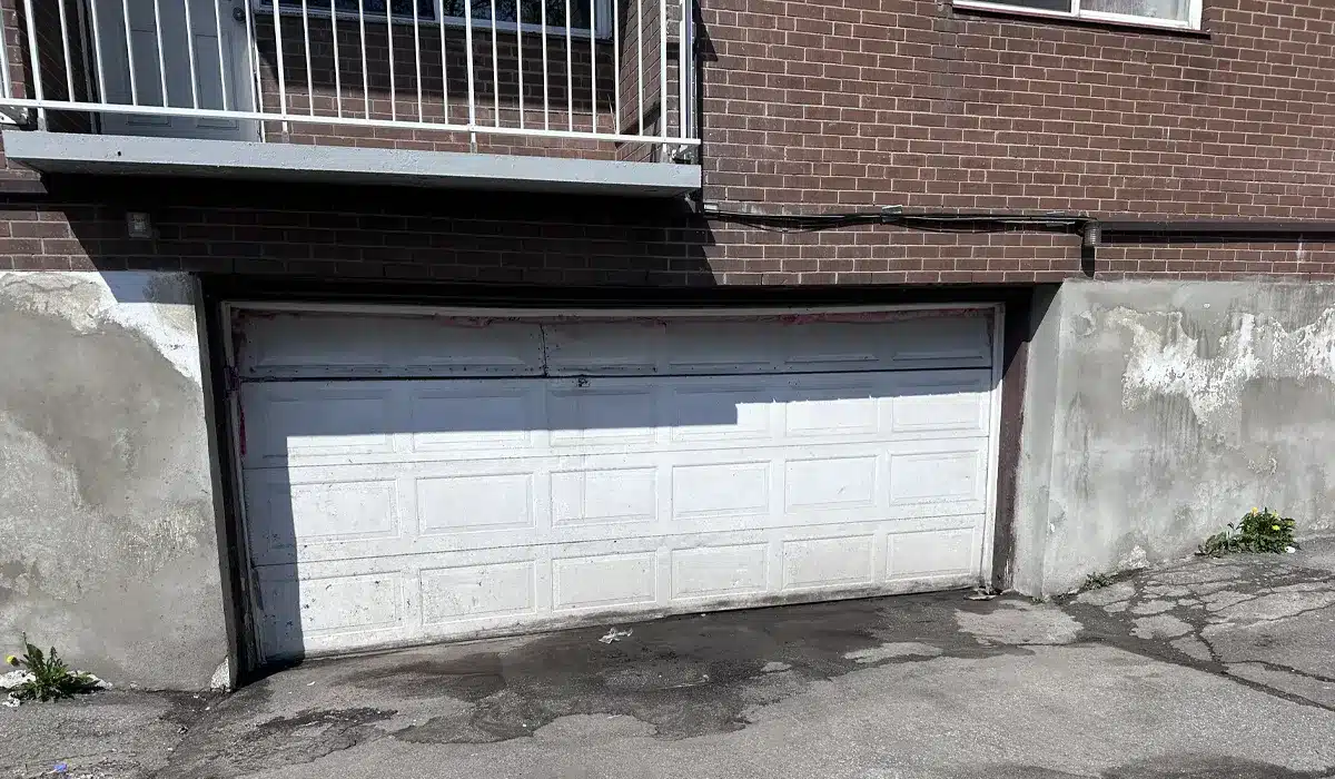 A garage door in Candiac residence attended by Unique Garage Door technicians for an emergency repair