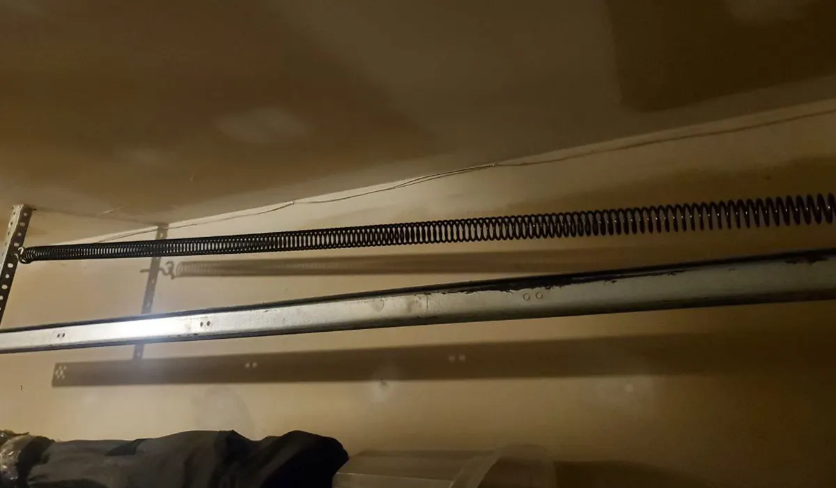 Broken Garage Door Spring Repair in Anjou