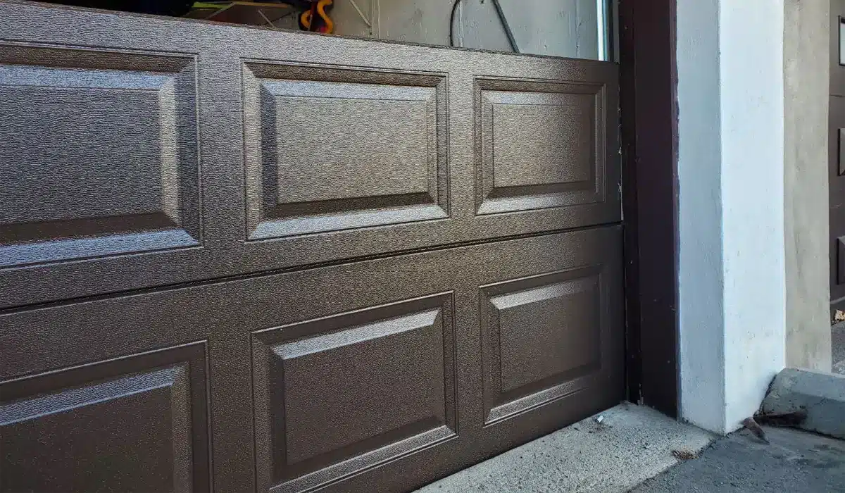 A modern insulated garage door panel installed in Candiac residence