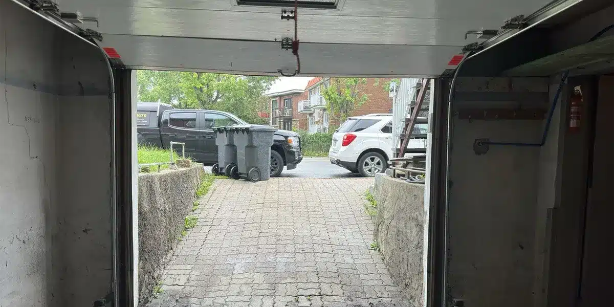 repairing a residential overhead garage door in a Terrebonne